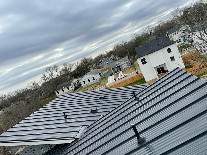 Standing seam metal roof panels with vents for Skylight Repair in Pepperell